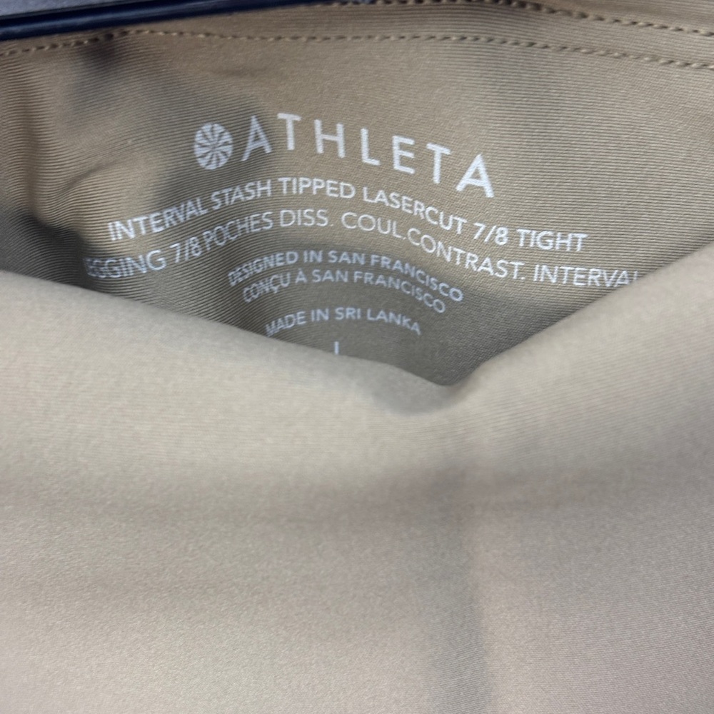 NWT Athleta Interval Stash Tipped Lasercut 7/8 leggings w/Pockets in Clay/Navy - Picture 5 of 12